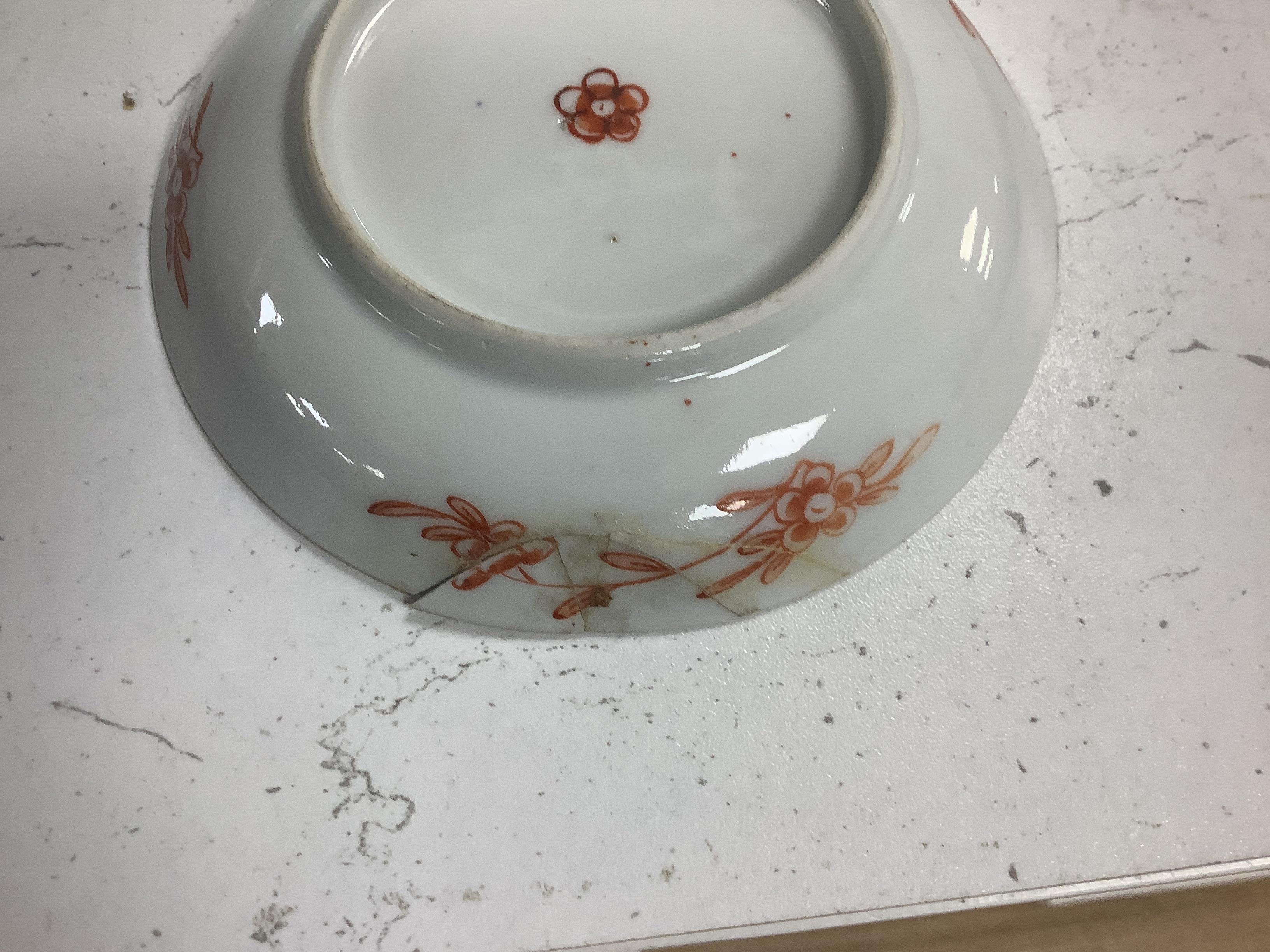 A set of six early 18th century Chinese cups and saucers with Dutch enamelled decoration, c.1710, 7.5cm high